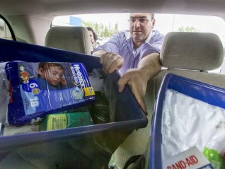 Syrian refugees in Calgary step up to help Fort McMurray fire evacuees