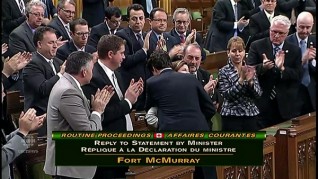 Trudeau crossed the floor, shook Ambrose's hand